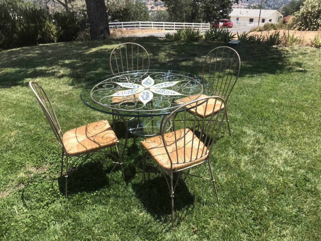 Glass table and four chairs